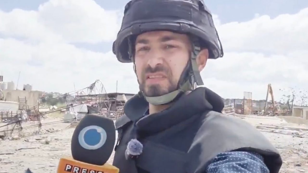 WATCH: Iranian journalist in south Lebanon struck by Israeli missile shrapnel